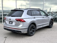 * R-Line exterior design with black styling elements, Black window surrounds, and Black exterior mir... (image 2)