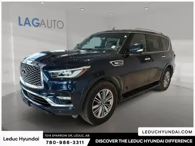 2023 INFINITI QX80 LUXE Experience the INFINITI QX80 LUXE with just 51891 km, finished in a sharp He...