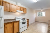 Amenities: Spacious Rooms • In-suite Laundry • Private Yard Suite & Building: Two-bedroom and three-... (image 3)