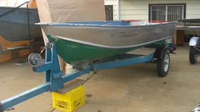 PLEASE READ FULL AD---NICE AFORDABLE 12 FT BOAT WITH 6 HP JOHNSON SITTING ON A TILT DECK TRAILER--EV...