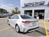 Looking for a reliable, stylish, and fuel-efficient sedan? This Silver 2022 Toyota Corolla XLE LE ch... (image 3)