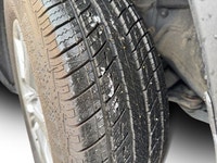 This Toyota RAV4 is equipped with: Cloth Seat Trim, Heated front seats, Power moonroof, Radio: 8 Toy... (image 4)