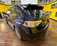 This impressive 2011 Subaru Impreza WRX STI is proudly offered by Auto Avenue Airdrie. Built for dri... (image 2)
