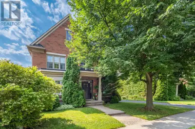 Stunning detached home with carriage style character and curb appeal on a highly desirable street in...