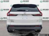 The 2024 Honda CR-V Hybrid Touring is a pre-owned compact SUV that emphasizes refined comfort, effic... (image 5)