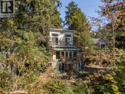 Perched above Florence Lake on a private, treed lot, this bright and spacious 3-bedroom home include...