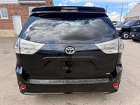 Looking for a reliable and spacious family vehicle? Check out this sleek black 2011 Toyota Sienna SE... (image 5)