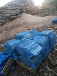Whole sale firewood bags on pallets attention buyers