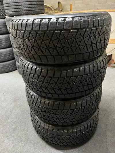 Nice set of Bridgestone Blizzak DM-V2 winter tires. 255/50/20 3 x 9.5/32nd tread remaining 1 x 11/32...