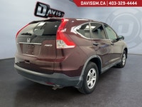The 2013 Honda CR-V LX 4WD delivers a smart combination of everyday practicality, confident all-weat... (image 4)
