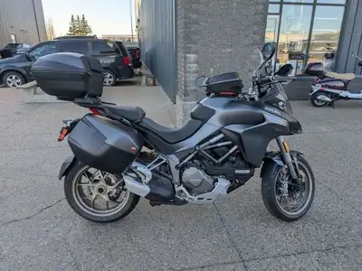 Like new 2019 Multistrada 1260 S Touring with only 2,553 km. This bike is in mint condition and incl...