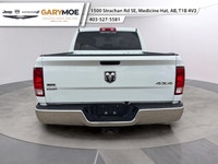 Presenting the stunning 2023 Ram 1500 Classic SLT 4x4 Crew Cab in an elegant White finish, paired wi... (image 3)