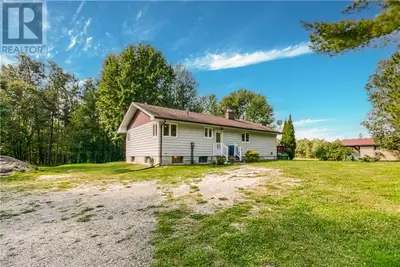 Nearly 50 acres of rolling meadows and mature trees surround this charming, quality-built home. Insi...