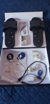 Tens Massager for body and has feet slippers and ear clips too.