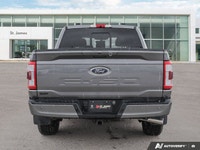 * Leather-trimmed heated and ventilated front bucket seats with a 10-way power driver's seat * 12-in... (image 3)