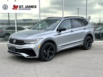 * R-Line exterior design with black styling elements, Black window surrounds, and Black exterior mir...