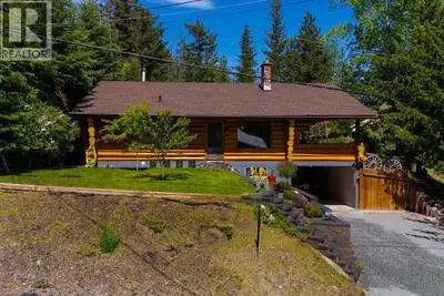 Proud owners of over 30 years would like to introduce you to this immaculate 4 bedroom log home flau...