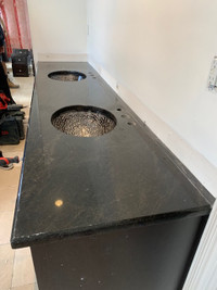 Double granite vanity with sink and new faucets .. Available now