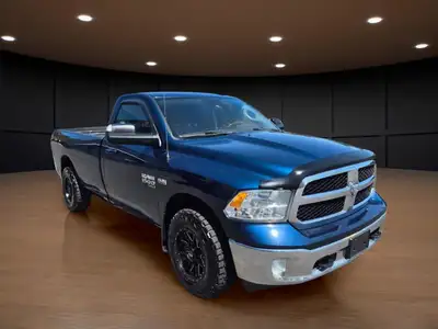 Experience the perfect blend of power and style with the 2020 Ram 1500 Classic SLT 4x4 Reg Cab, dres...