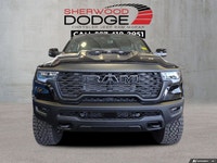 This Ram 1500 has a powerful Twin Turbo Premium Unleaded I-6 3.0 L/183 engine powering this Automati... (image 3)