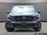 The 2026 Honda CR-V Hybrid EX-L AWD in a striking Blue finish offers both power and precision with i... (image 1)