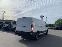 Focused on utility and economy, this Ford Transit is a strong contender in the work van market. This... (image 4)