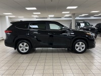 The citys lights ripple across wet pavement as the Midnight Black Metallic finish glides past, its L... (image 6)