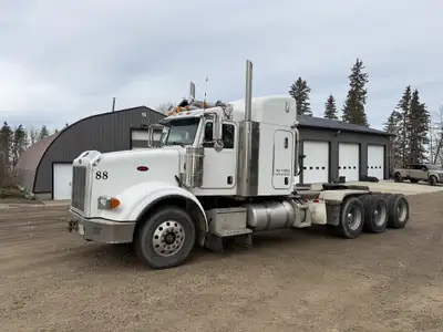 2006 Peterbilt 378 Tri-axle Sleeper Truck Tractor Comes with a Caterpillar C-15 diesel engine, 76092...