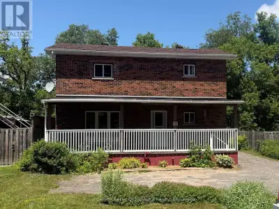 FOUR BEDROOM, 2 FULL BATH BRICK HOME WALKING DISTANCE TO DOWN TOWN. This well- maintained legal bric...