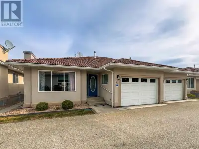This level-entry, two-bedroom plus den townhome in the private seven-unit Cedar Crest 55+ complex of...