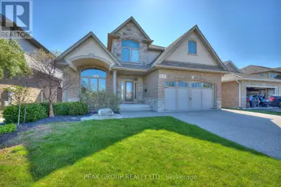Welcome to this custom executive home, boasting nearly 4000 sqft of finished living space! This exqu...