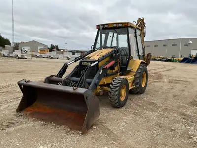 Iron Inventory Inc! Cat 416C IT backhoe is powered by a 79hp Caterpillar diesel engine. Rear hoe is...