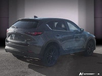 Le Mazda CX-5 Kuro 2022 est une édition spéciale qui allie style audacieux et performance équilibrée... (image 6)