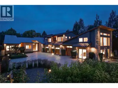A gated waterfront residence on prestigious Whitworth Road, where over 7,000 sq. ft. of refined livi...