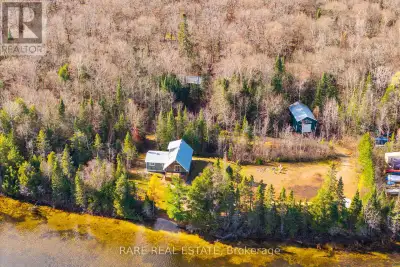 Escape to Kawawaymog Lake, the western gateway to Algonquin Park, and discover a rare off-grid prope...