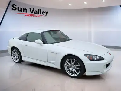 Feel the wind in your hair as you cruise the open road in a Honda S2000. With keyless entry for conv...