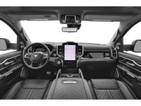 The 2026 Ram 1500 Tungsten, finished in a pristine white, epitomizes power and control with its 44 d... (image 4)