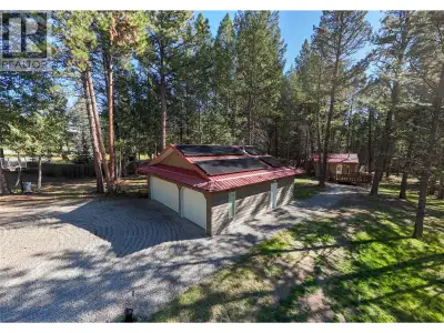 Discover your own private oasis on this beautifully treed and fully fenced 2.5-acre property in Bayn...