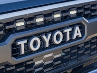This Toyota is a tough and reliable midsize truck that is built for both everyday driving and off-ro... (image 8)