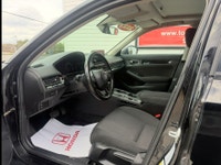 A modern and efficient compact sedan with a refined interior, advanced safety features, and smooth t... (image 8)