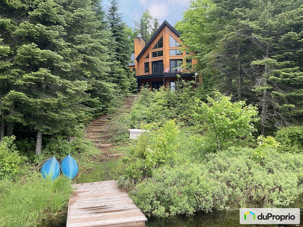 $950,000 - 1 1/2 Storey for sale in Ste-Agathe-Des-Monts — photo 1