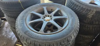 Set of four 245/60R Total Terrain all-season tires mounted on 18x8" wheels. Removed from a 2011 Ford...