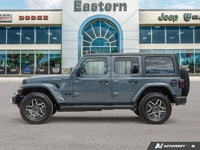This Jeep Wrangler has a trusty Regular Unleaded V-6 3.6 L/220 engine powering this Automatic transm... (image 1)