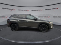 This Hyundai Tucson has a strong Gas 4cyl 2.5 L engine powering this Automatic transmission. Black L... (image 8)