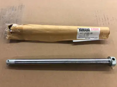 NOS Yamaha rear axle # 537-25381-01 fits 1976 YZ125X model 1976 to 1979 ZY 100 and 1976 YZ 125.