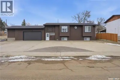 Dream garage alert! This bi-level home boasts over 1,200 sq.ft. with 4 beds and 3 baths as well as o...