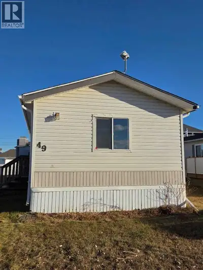 Affordable home needing a little TLC. This 1216 sq ft home features 3 bedrooms and 2 full baths. Thi...