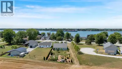 Modern craftsmanship meets peaceful country living in this beautifully built 2021 custom bungalow of...