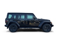 This 2025 JEEP WRANGLER 4-DOOR SPORT has the following options Cloth Low-Back Bucket Seats, Uconnect... (image 6)
