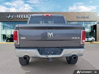 Dominate the road and conquer any challenge with this commanding 2017 Ram 1500 Laramie, finished in... (image 3)